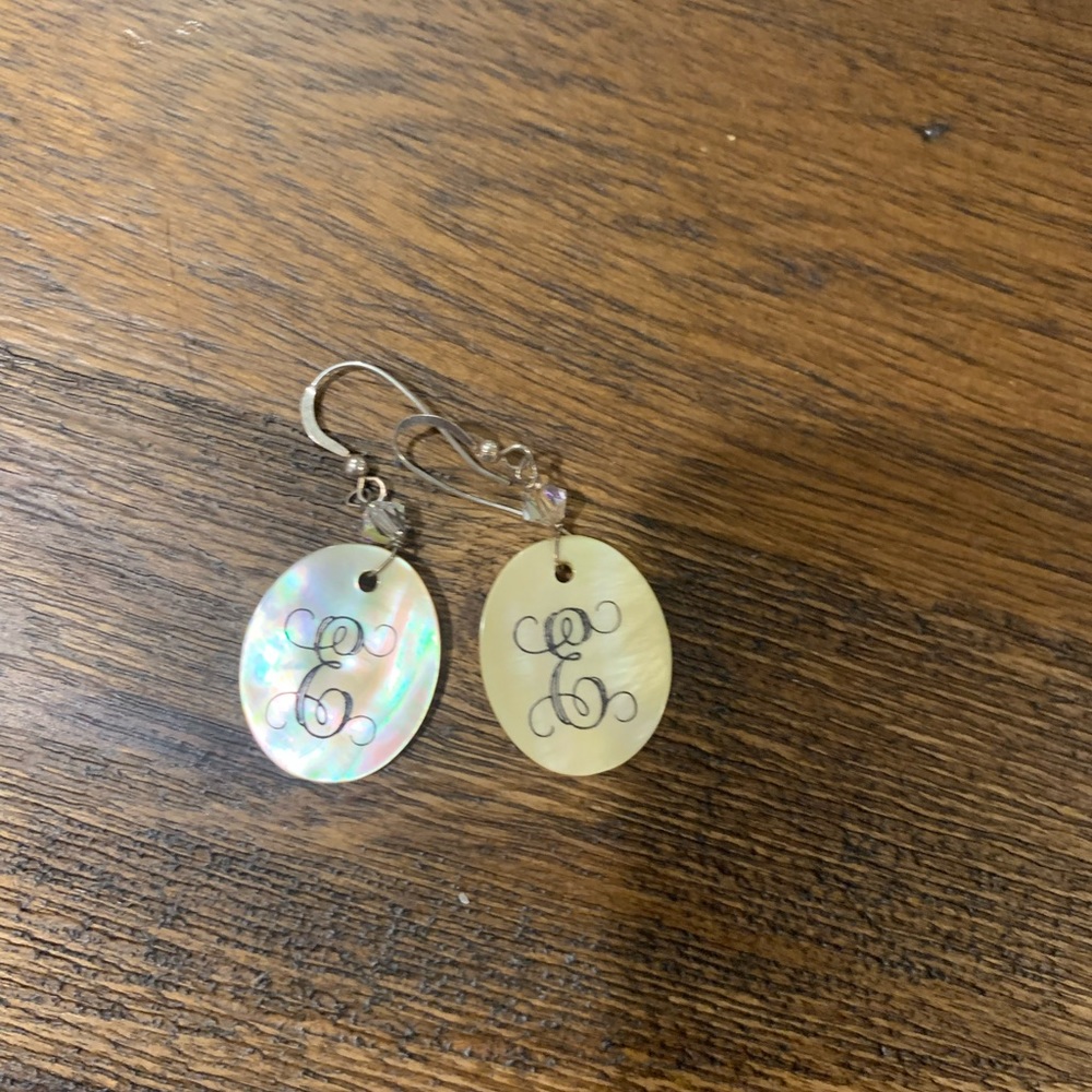 E dangle earrings